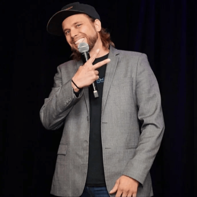 Brian holding a microphone during his Affiliate Summit East 2019 talk