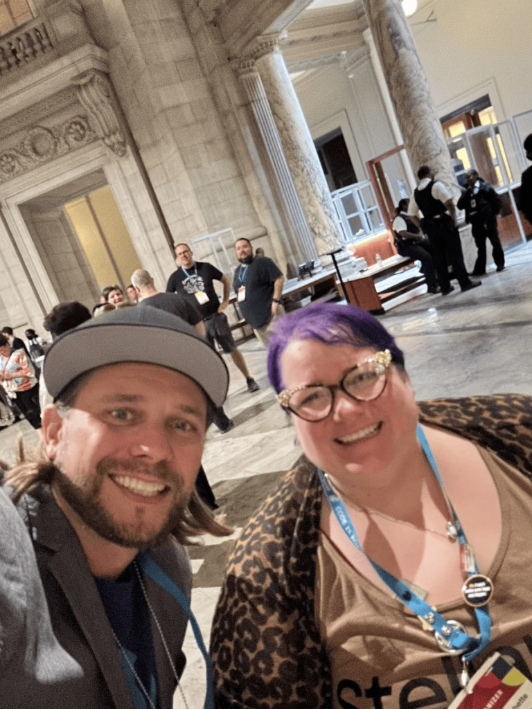 Brian with a friend at the WordCamp US 2023 after party