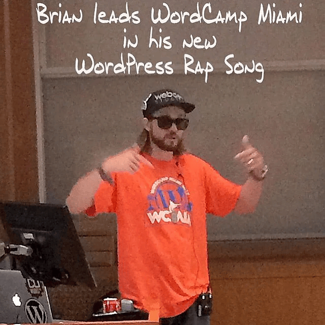 Brian Messenlehner performing a WordPress rap at WordCamp Miami