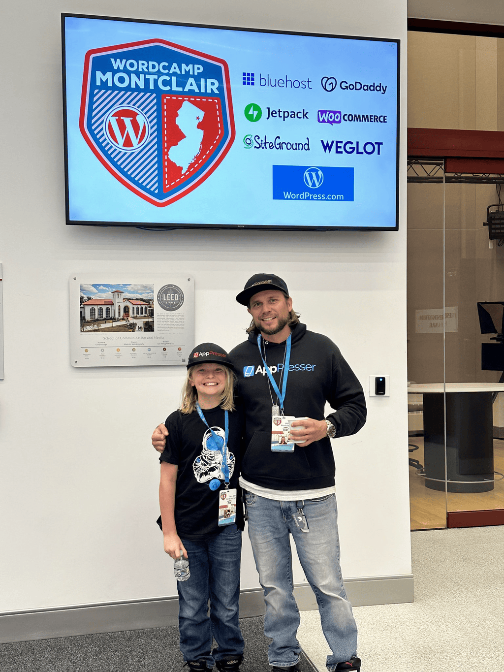 Brian Messenlehner and one of his kids in matching AppPresser caps at WordCamp Montclair