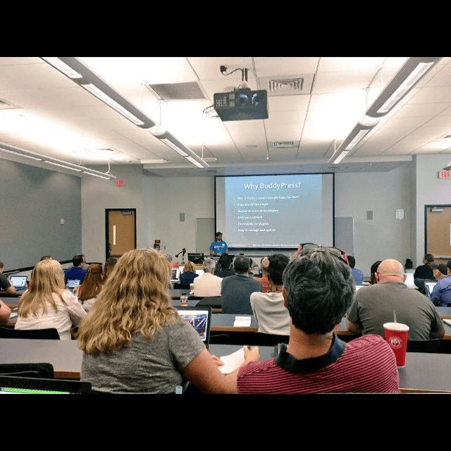 Attendees watching a presentation at BuddyCamp Miami 2015