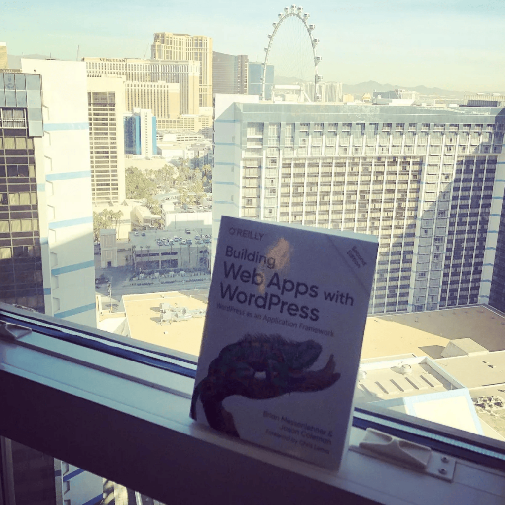 The second edition held up in front of the Las Vegas skyline