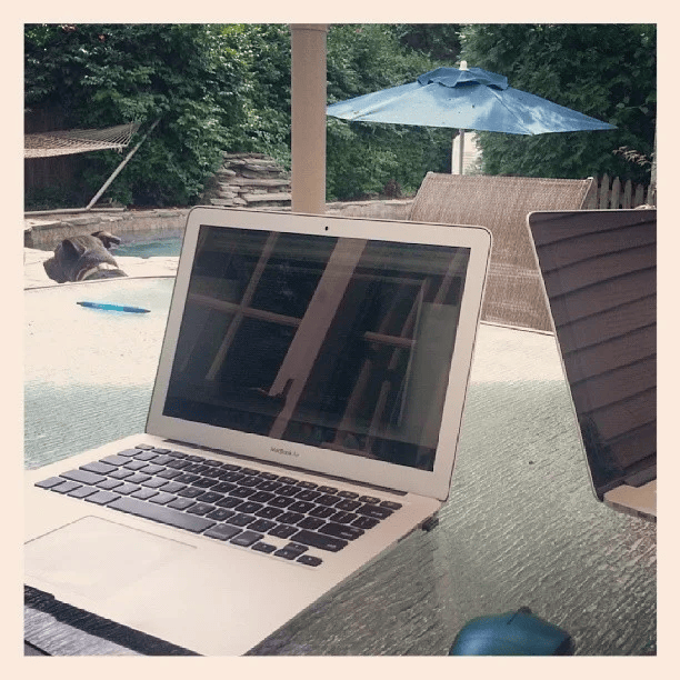 Laptop by the pool while finishing the book manuscript