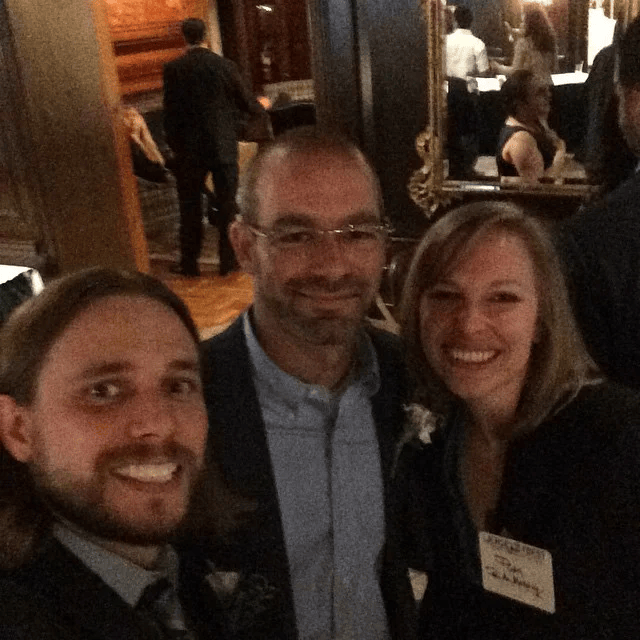 Brian with two guests at the 2015 under 40 induction reception