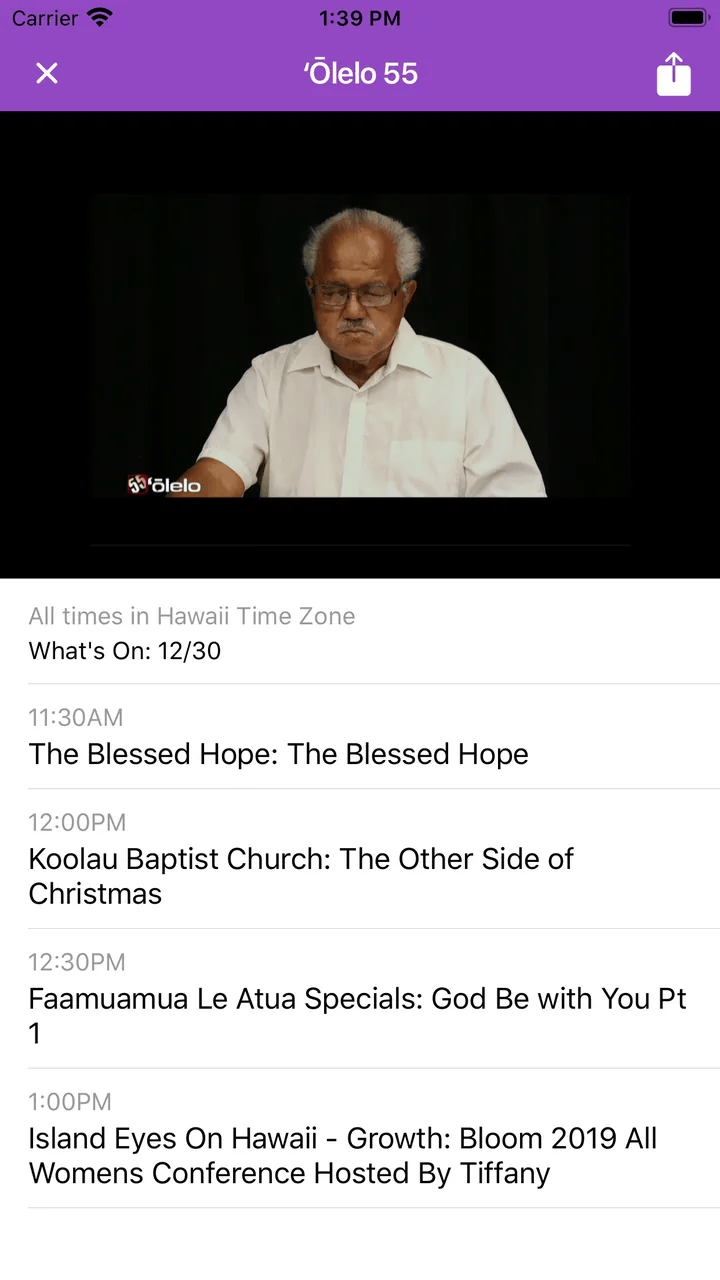 'Ōlelo 55 playing live in the iPhone app, a speaker on screen, with the upcoming programs listed below the player