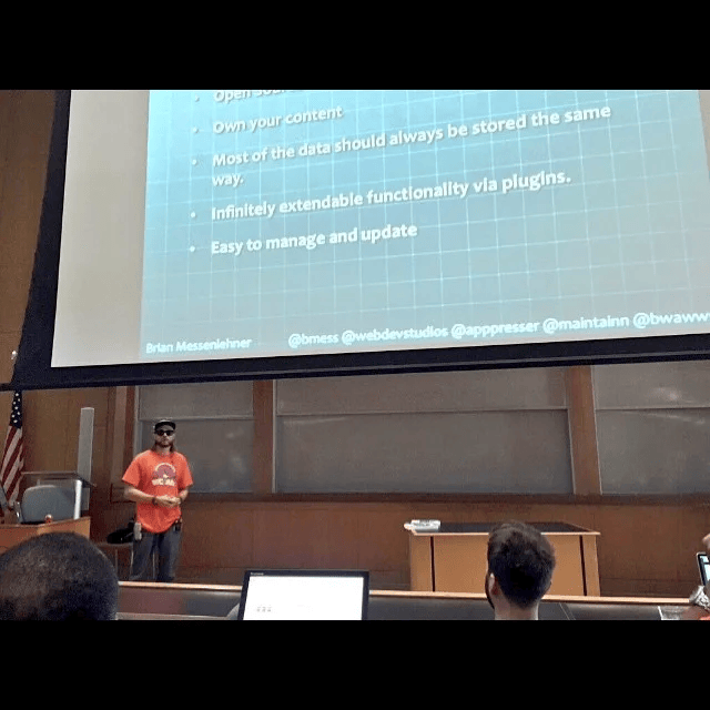 Brian presenting migration slides to the audience at WordCamp Miami 2015